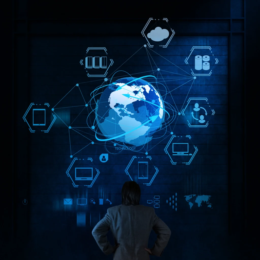 man inspecting technology hologram in a dark room